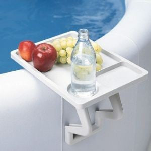 AquaTray adjustable spa side table attached to a hot tub holding drinks and snacks